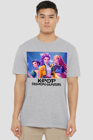 Young man wears gray T-shirt featuring three animated female characters with colorful hair and "KPOP DEMON HUNTERS" text below.
