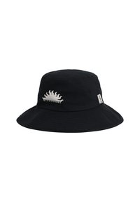 Black bucket hat made of canvas. Features a curved brim and a white sun graphic embroidered on the front. Side tag is visible.