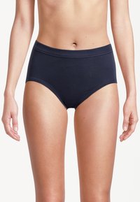 Høj-taljede mørkeblå bomuldsunderbukser med en glat taljebånd, der har et tætsiddende design og blød tekstur for komfort.