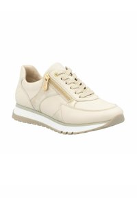 Sneaker in pelle beige con dettagli testurizzati e zip dorata, presenta una suola intermedia bianca e una suola in gomma per la trazione.