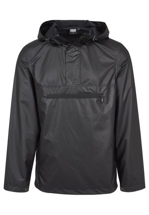 Čierna kapucňová anorak bunda vyrobená z lesklého, vodoodolného materiálu. Obsahuje predné vrecko na zips a elastické manžety pre bezpečné priliehanie.