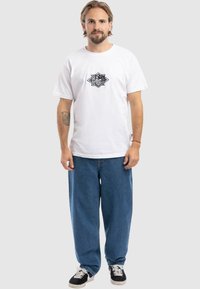 Homeboy X-TRA BAGGY  - Traperice ravnih nogavica - washed blue denim