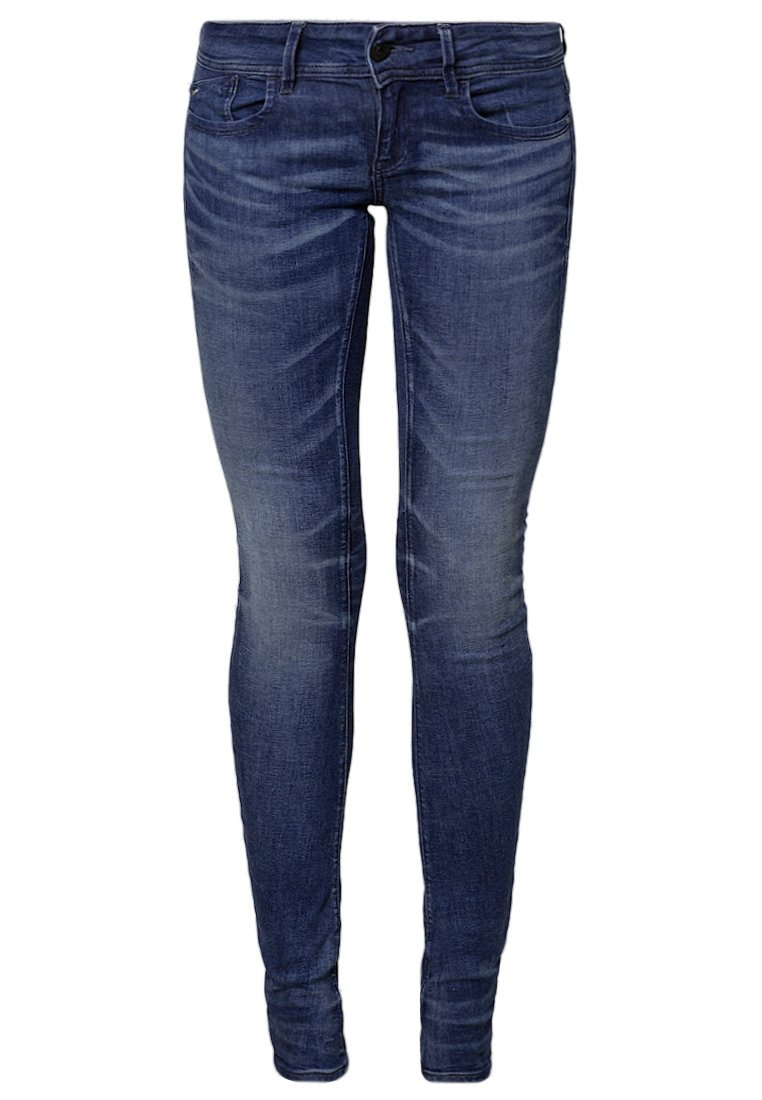 Skinny blue jeans made of denim. Features a zip fly, front pockets, and subtle fading along the thighs. Smooth texture.