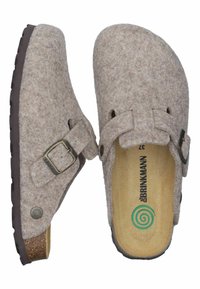 Brown felt clogs with a round toe, adjustable buckle, and a textured rubber sole. Natural cork footbed with a green spiral logo inside.
