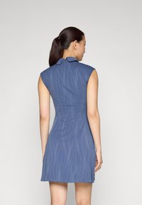 J.LINDEBERG Sports JILL DRESS 2-IN-1 - Tights - vintage indigo
