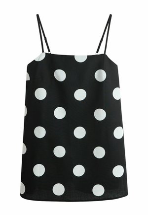Robe noire sans manches avec des bretelles fines, ornée de grands pois blancs espacés uniformément sur le tissu.