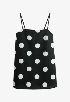Robe noire sans manches avec des bretelles fines, ornée de grands pois blancs espacés uniformément sur le tissu.