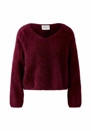 Burgundy cashmere sweater with a soft, fluffy texture, V-neckline, and long sleeves featuring a cropped design.