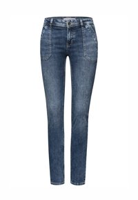 Vaqueros de corte ajustado en azul oscuro, con cintura estándar, dos bolsillos frontales y un ligero desgaste en la tela.