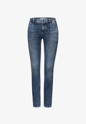Jean en denim skinny-fit bleu foncé, avec une taille standard, deux poches avant et un léger effet distendu sur le tissu.