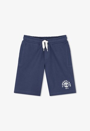 Navy blue Timberland shorts with white drawstring, side pockets, and logo with tree graphic and "1973" on the left leg.