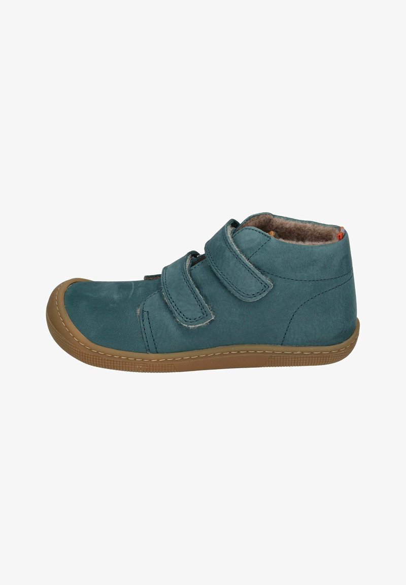 Teal suede ankle boots with two velcro straps, brown rubber sole, and padded interior lining for comfort. Reinforced toe cap detail.