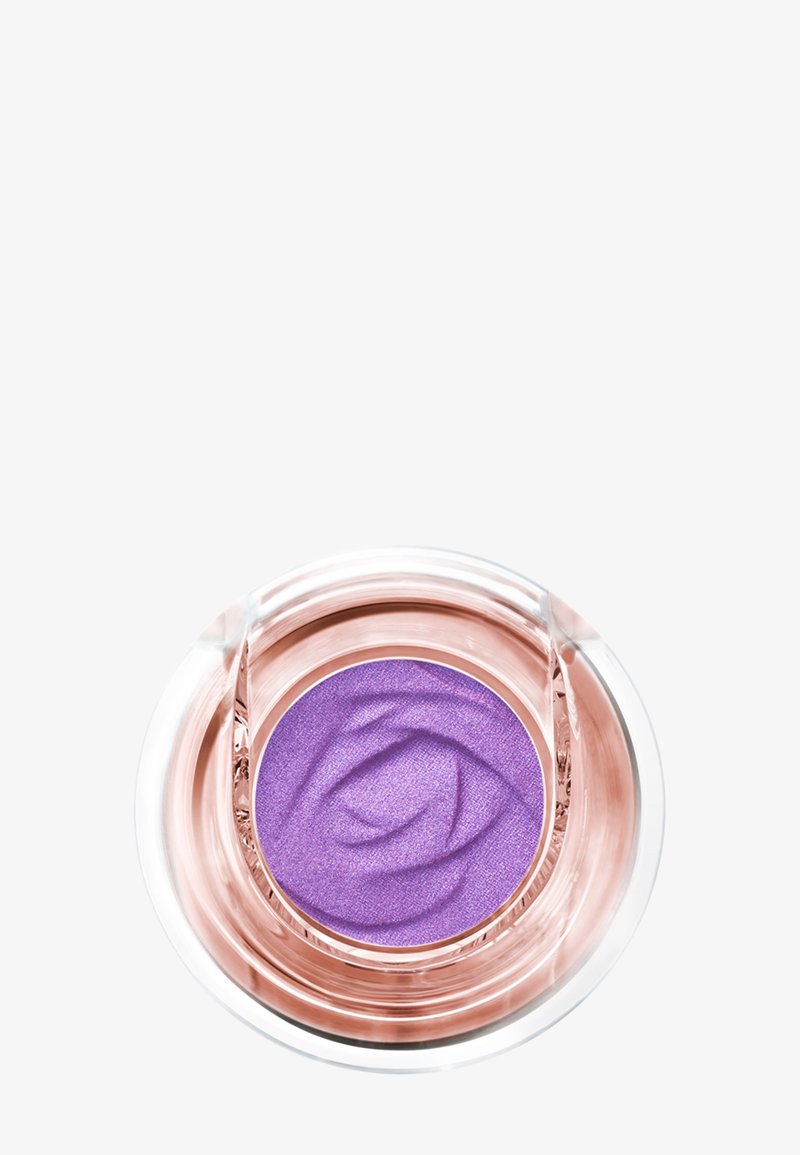 Ombre à paupières crème violette dans un contenant rond, transparent et en or rose, avec une texture lisse et tourbillonnante.
