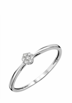 Silberring mit einem zarten, dünnen Band und einem zentralen Cluster aus kleinen runden Diamanten, die in einem floralen Design angeordnet sind.