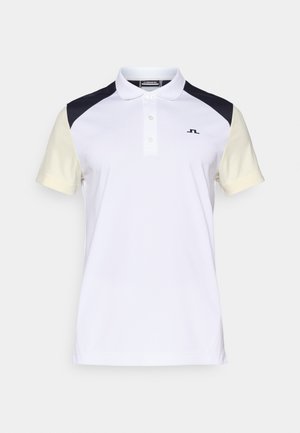 Miestenska polo košeľa v bielej farbe s námorníckym a svetlobežovým akcentom. Obsahuje golier, trojradový gombíkový zapínací systém a logo na ľavej hrudi.