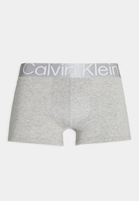 Sive pamučne bokserice s mekim elastičnim pojasom s 'Calvin Klein' brendingom u svijetlosivoj boji. Glatka tekstura s prilagođenim dizajnom.
