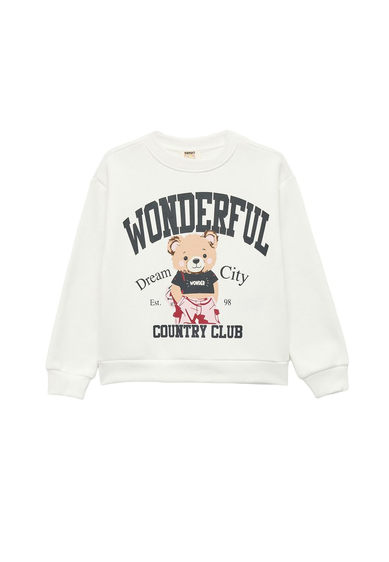 Sudadera blanca con cuello redondo, que presenta un gráfico de un oso vestido con una camiseta negra. El texto dice "MARAVILLOSO", "Ciudad de Sueños" y "CLUB DE CAMPO".