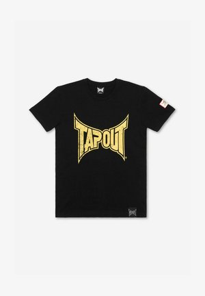 Schwarzes Baumwoll-T-Shirt mit einem großen, leicht verwaschenen gelben "TAPOUT"-Logo auf der Vorderseite. Enthält ein kleines Markenlabel unten links.