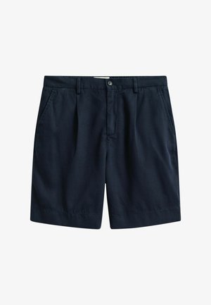 Marineblauwe op maat gemaakte korte broek met knoopsluiting, lussen voor een riem en zijzakken, weergegeven op een witte achtergrond.