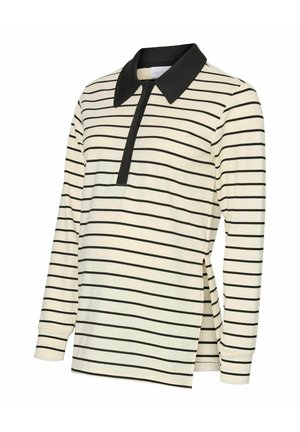 Polo à manches longues en crème avec des rayures noires, doté d'un col noir et d'une fermeture à glissière frontale partielle. Fentes sur les côtés pour un meilleur confort de mouvement.