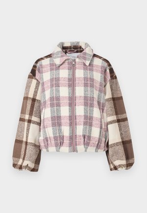 Veste à carreaux avec fermeture éclair à l'avant, présentant des nuances de rose, marron et crème. Fabriquée en tissu doux, avec un col et des poignets élastiques.