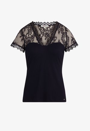 Black top featuring a ribbed fabric body and sheer lace short sleeves with floral pattern and scalloped edges. V-neck design.