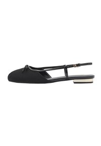 Black ballet flats with a pointed toe, flat heel, fabric upper, ankle strap, and bow detail. Features a contrasting metallic heel accent.