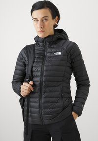The North Face BETTAFORCA HOODIE - Jakna ispunjena paperjem - black