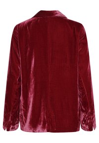 Blazer di velluto bordeaux con una texture liscia, maniche lunghe e colletto a risvolto. Presenta una cucitura posteriore dritta e spacchi laterali all'orlo.