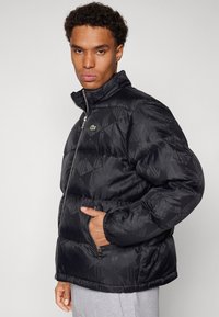 Lacoste Jakna ispunjena paperjem - black