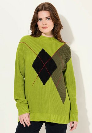 Groene gebreide trui met een geometrisch patroon, voorzien van een zwarte diamand en textuurelementen. Geribbelde manchetten en zoom verbeteren de pasvorm en stijl.