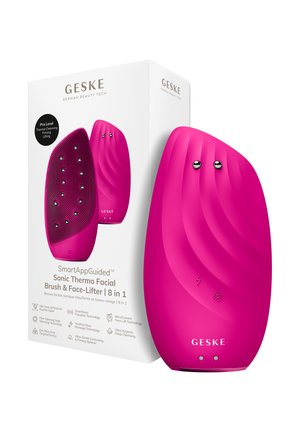 Felroze 8-in-1 sonische thermo gezichtsborstel en face-lifter apparaat met getextureerde en gladde zijkanten, naast witte verpakking.