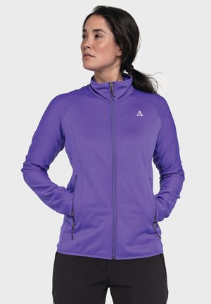Purple zip-up jacket with ribbed texture, high collar, and zippered pockets. Features a logo on the chest and fitted design.