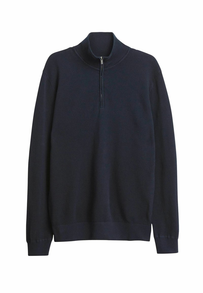 Laivaston pullover villapaita, jossa on puolivetoketjullinen kaulus, neulottu rakenne, pitkät hihat sekä resorit hihoissa ja helmassa. Tasainen kankaan pinta ja keveä muotoilu.