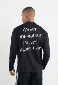 YOURTURN UNISEX - Tops ar garām piedurknēm - black