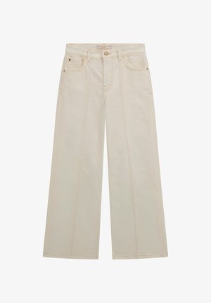 Trapezaste traperice - creme