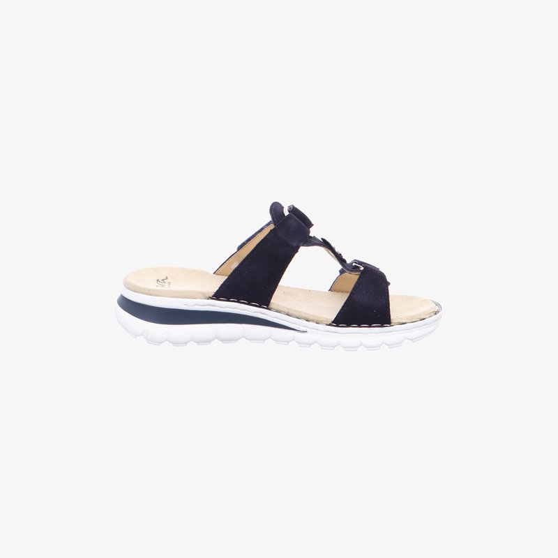 Sandale noire à bout ouvert avec semelle blanche épaisse, semelle intérieure beige rembourrée et deux lanières ajustables sur le pied et la cheville.