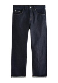 Tmavomodré rifle z denimu s klasickým rovným strihom, vybavené piatimi vreckami, zapínaním na gombíky a ohrnutými manžetami, ktoré odhaľujú svetlomodré podšívky.