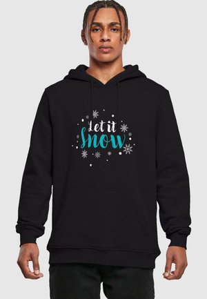 Sort hættejakke lavet af blødt stof med en frontlomme. Designet inkluderer teksten "Let it Snow" i teal og dekorative snefnug.