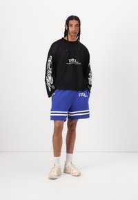 Pal Sporting Goods WET PASS UNISEX - Spodnji deli trenirk - bluig