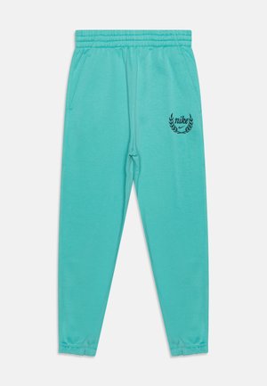 Tirkīza Nike sporta bikses, kas izgatavotas no mīksta materiāla, ar auklu jostasvietā, sānu kabatām un melnu logo ar lauru dizainu.