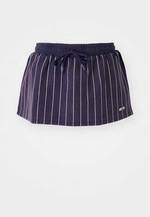 Mitternachtsblaue Skirt mit vertikalen weißen Streifen, elastischem Bund und Kordelzug. Besitzt ein kleines Logo am unteren rechten Saum.