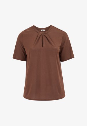 Blouse marron à manches courtes avec un col rond, comportant une petite découpe en forme de trou de serrure et un détail de tissu torsadé au centre devant.