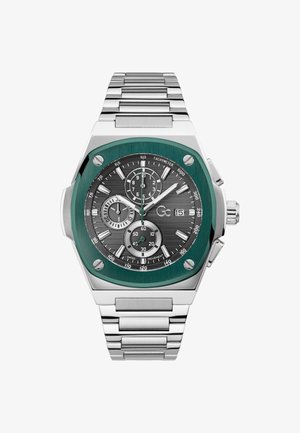 Hõbedane roostevabast terasest käekell rohelise raamiga, halli tekstuuriga sihverplaadi, kolme alamsihvriga ja lülideta rihmaga. Omadusteks on kuupäevakuvaga aken ja tahhümeeter.