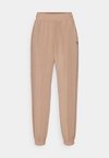 OLYMPE JOGGER - Pantaloni sportivi - praline