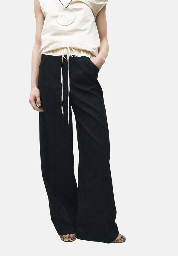 RUBI - Trousers - zwart