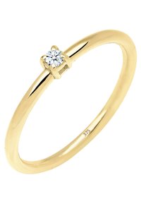 Guld ring med en poleret finish og en enkelt rund diamant indsat i en simpel fire-prongs indstilling. Stemplet med "375" for guld renhed.