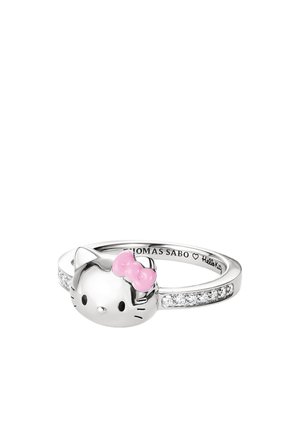 Silberner Ring mit einem Hello Kitty Gesicht, rosa Schleife und kleinen klaren Steinen entlang des Rings, graviert mit "Thomas Sabo" und "Hello Kitty."