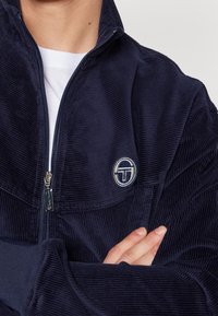 Sergio Tacchini Lehká bunda - blue