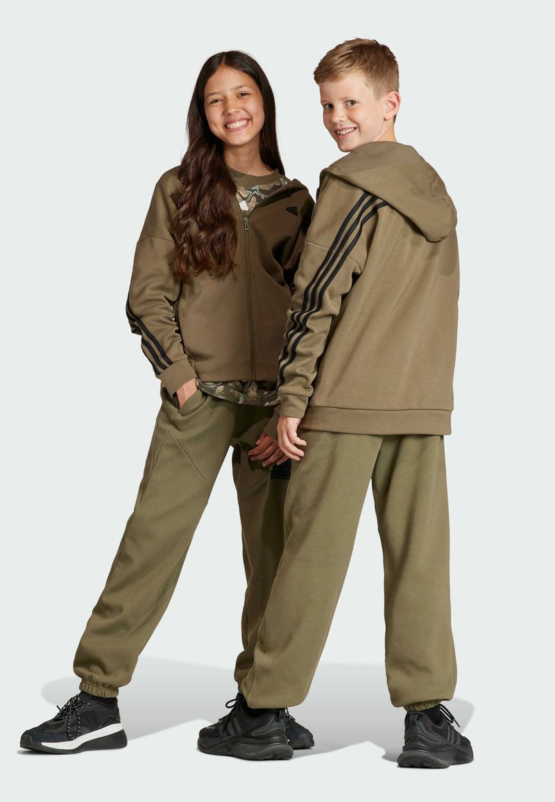 adidas Performance FUTURE ICON - Pantalones deportivos - olive strata   black